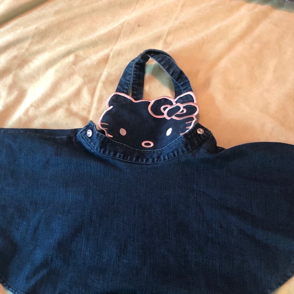 Hello Kitty sz 6 jumper/ stretch denim/crisscross straps/ circle skirt/ licensed